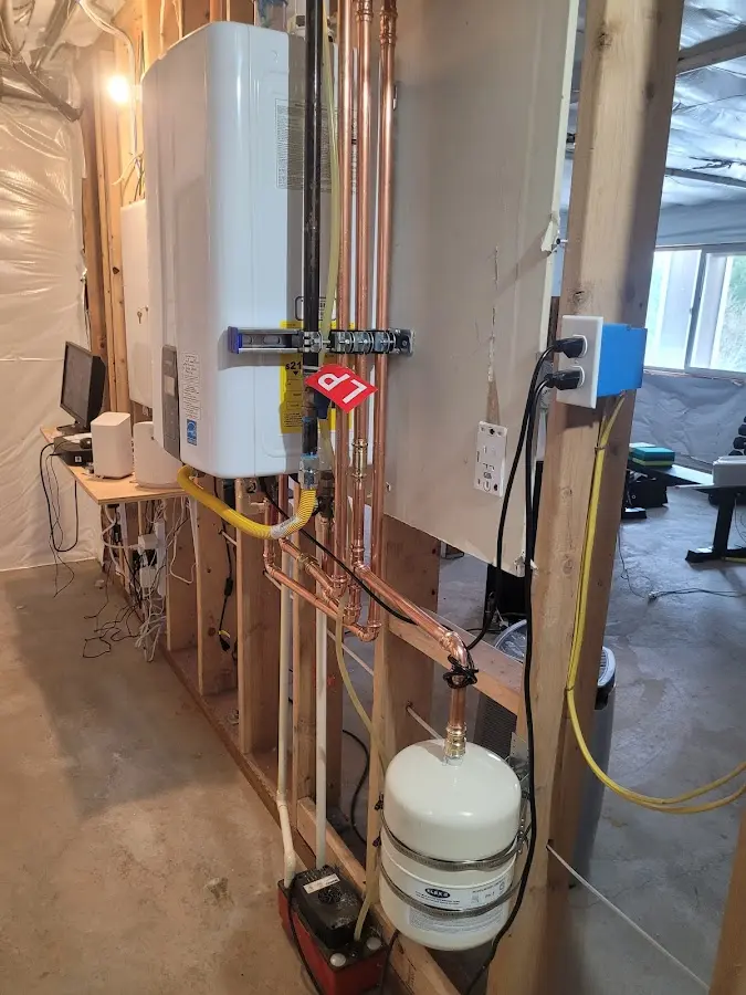 Licensed plumber repairing a kitchen sink in Picayune
